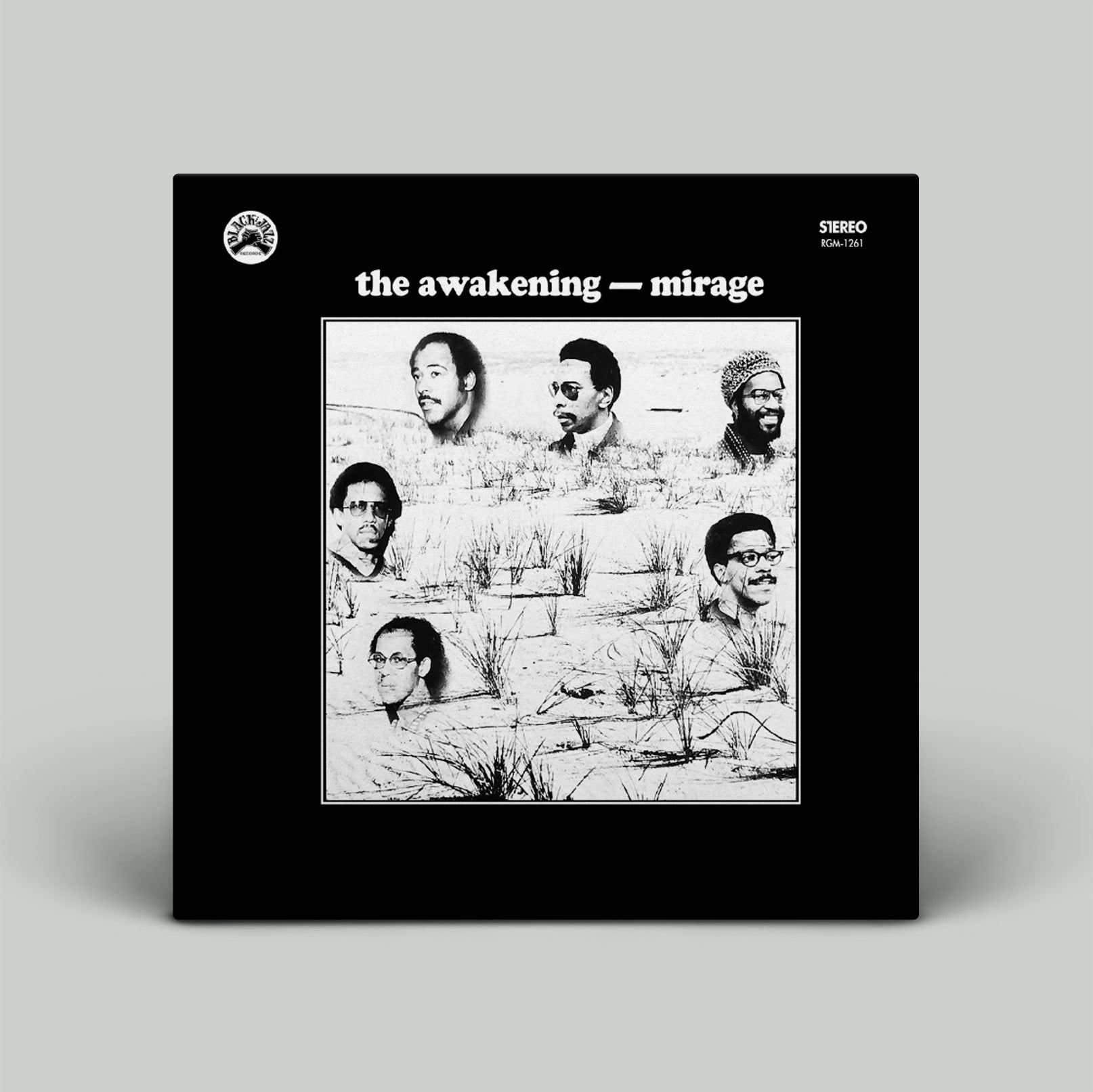 Album cover for 'the awakening - mirage' with black and white illustration of a person in a field.