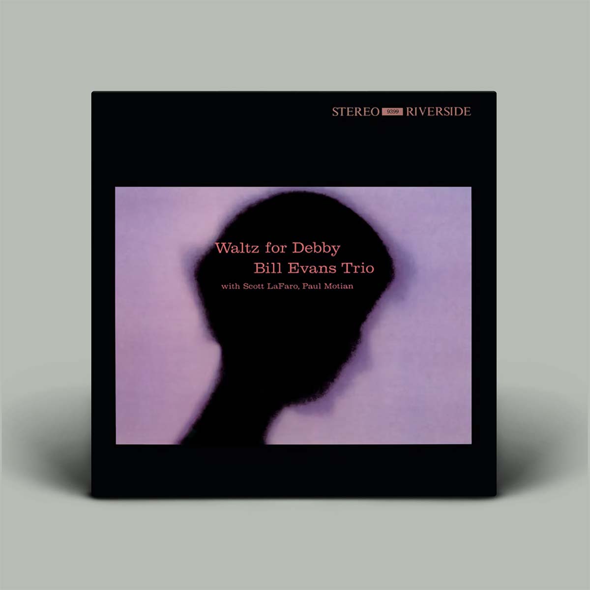 Album cover of 'Waltz for Debby' by Bill Evans Trio with a silhouette and purple gradient.