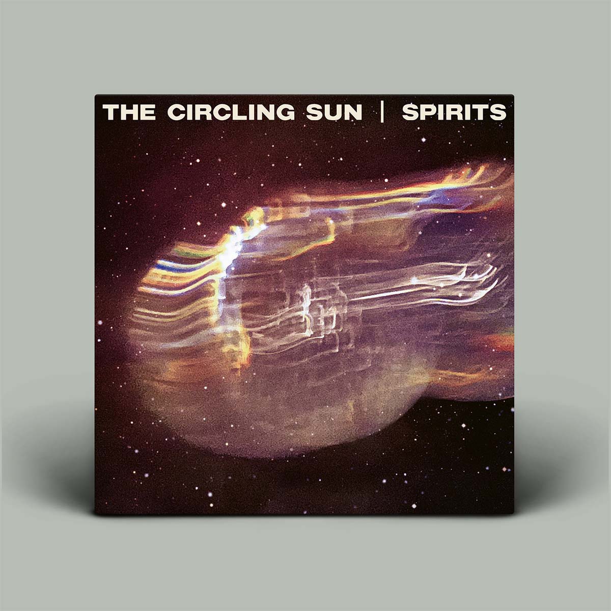Album cover for 'The Circling Sun | Spirits' with abstract design and text on a gray background