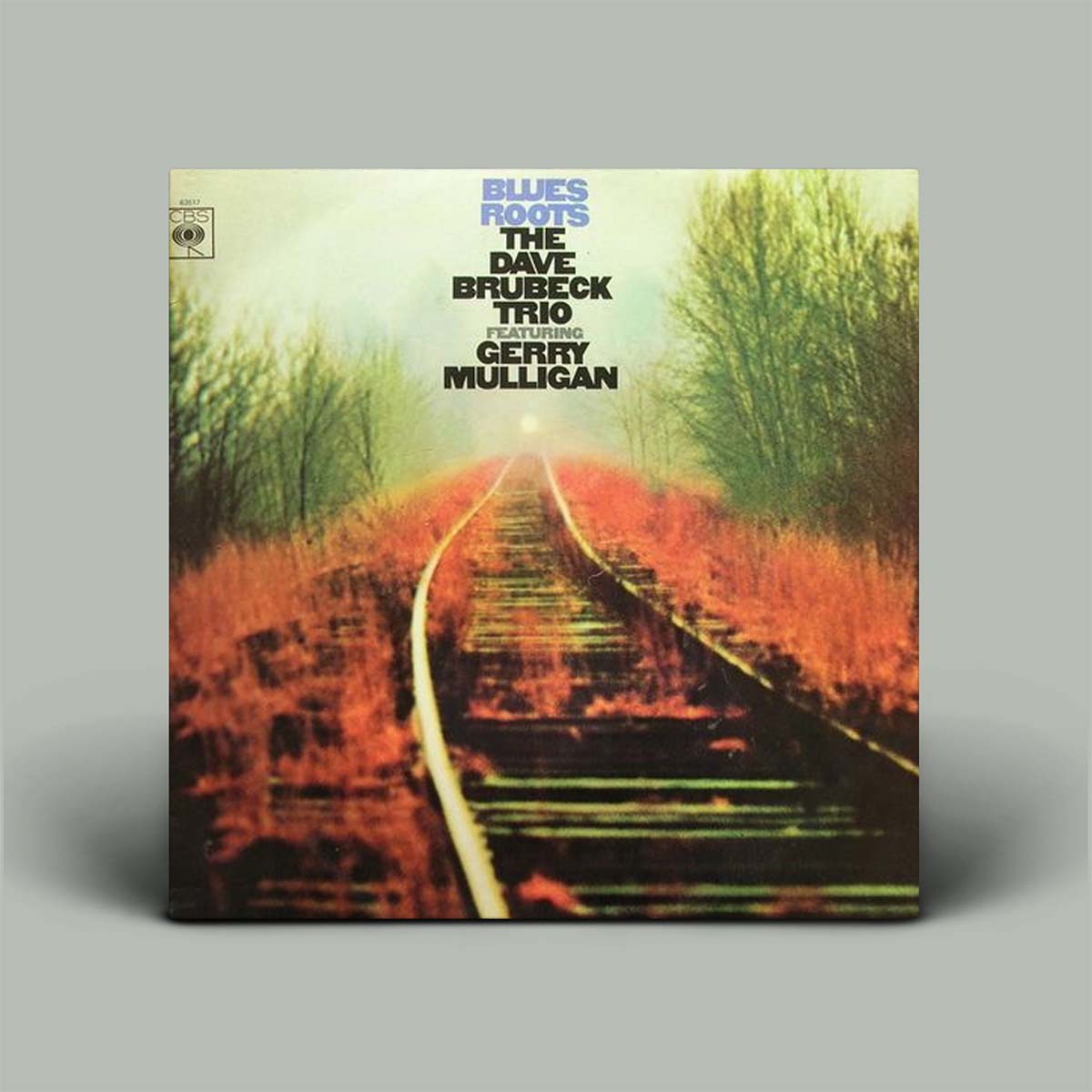 Album cover with train tracks leading into a forest, featuring text about the Dave Brubeck Trio and Gerry Mulligan.