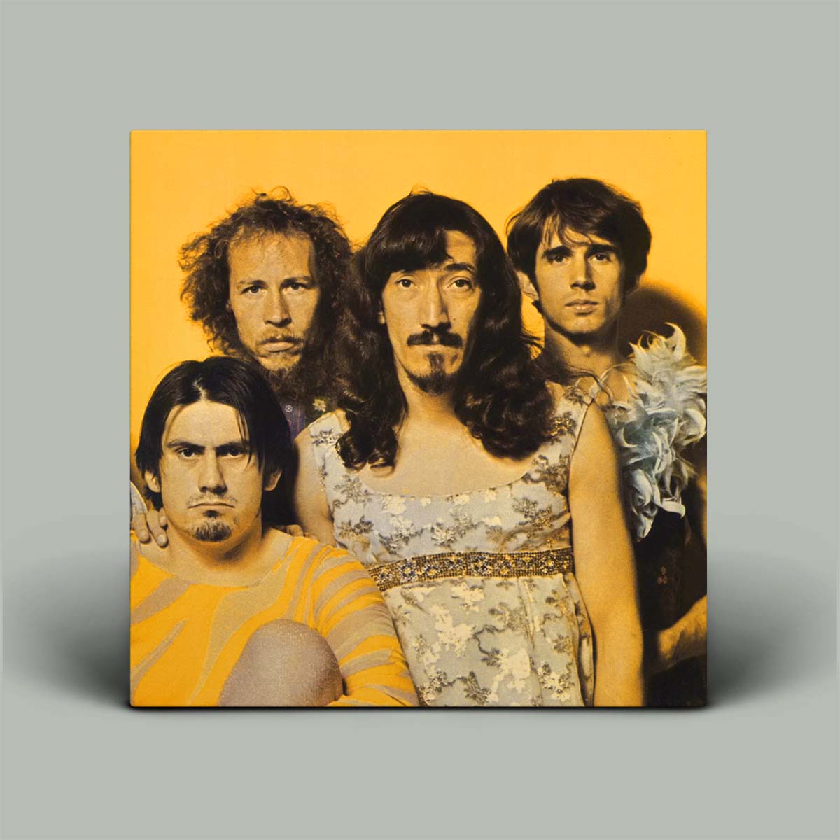 Album cover with four individuals on a yellow background