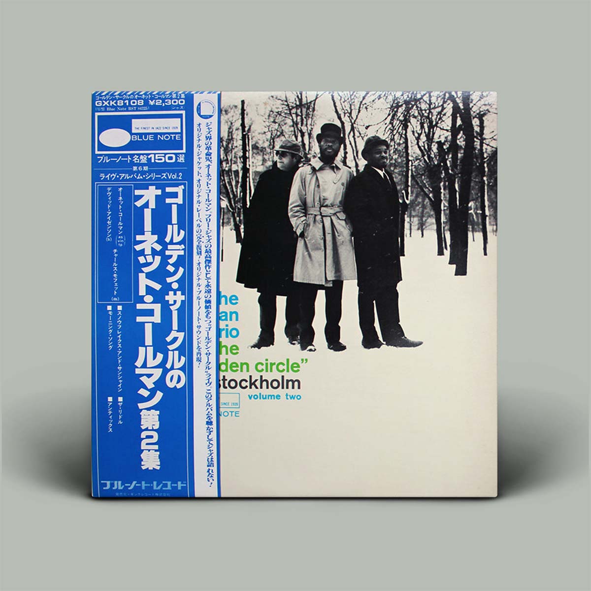 Album cover with three people in a snowy landscape and blue and white text