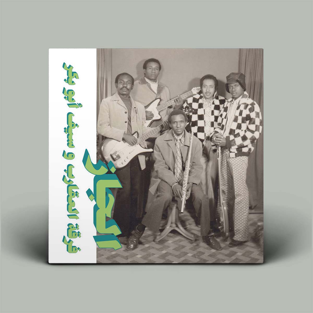 Album cover with a black and white photo of a band and decorative text on a gray background