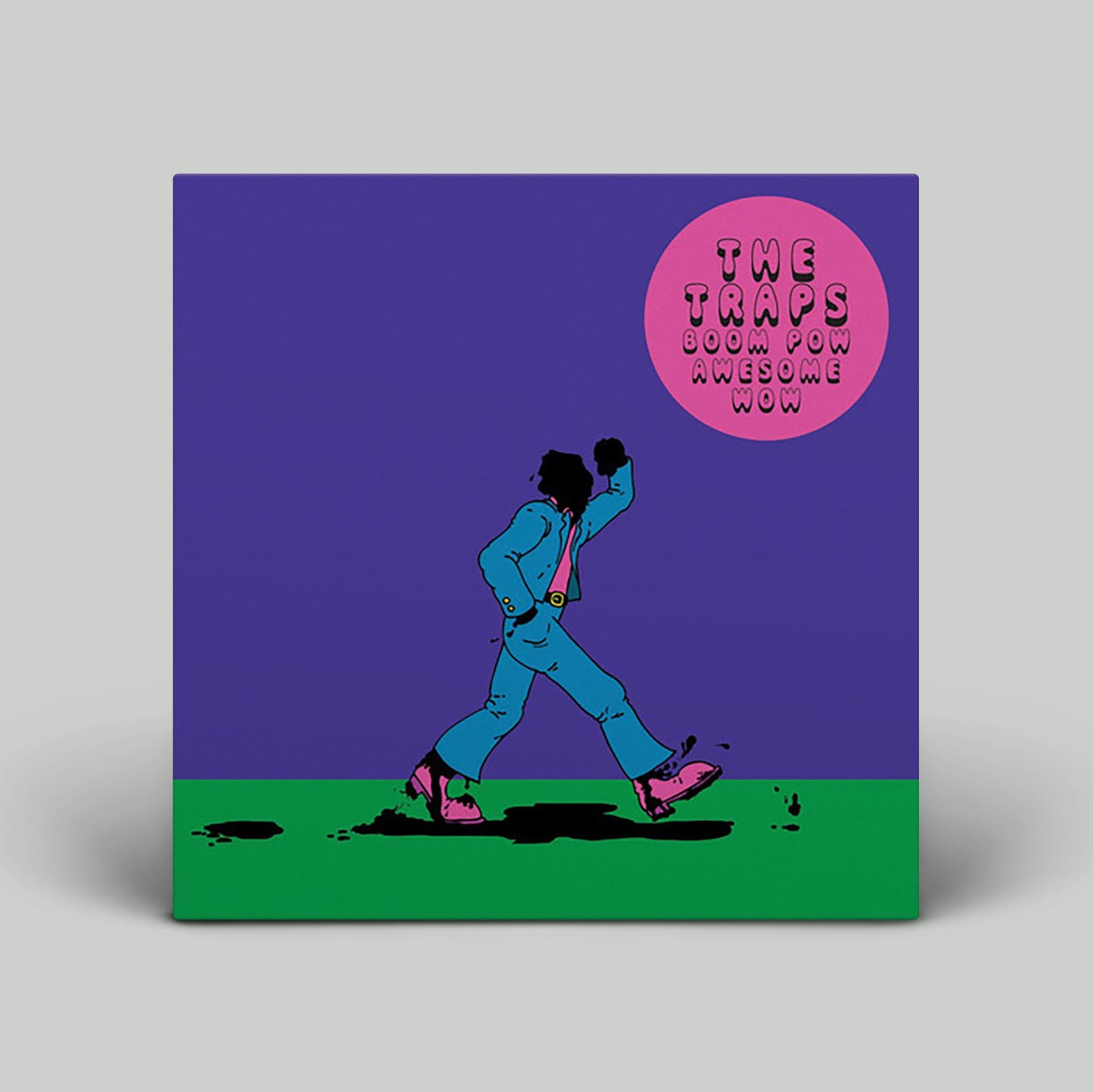 Album cover art featuring a cartoon character in a suit and the text 'The Traps - Boom Pow Awesome Wow' set against a purple background.