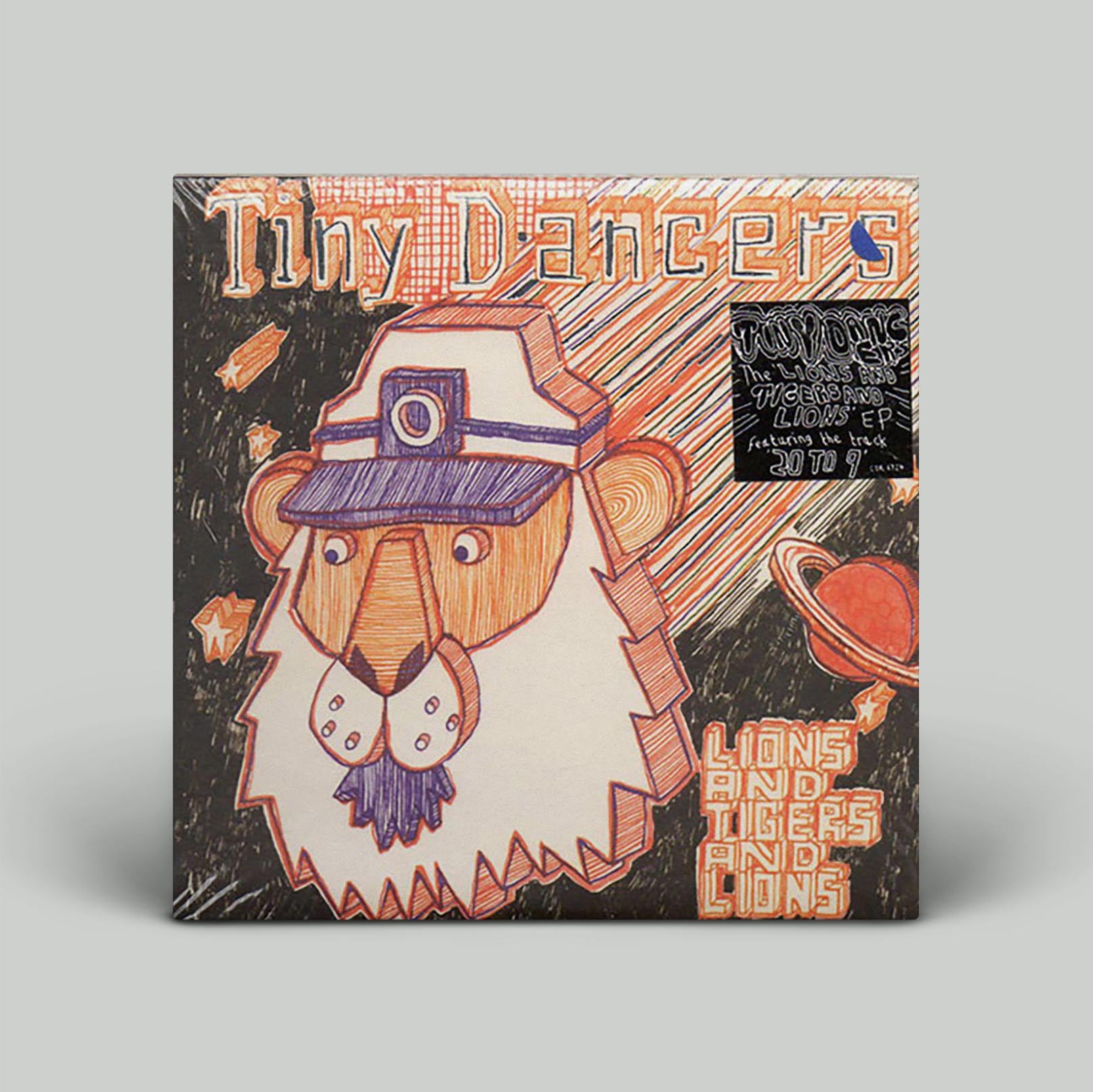 Record cover art featuring a cartoonish lion with a hat and sunglasses, titled 'Tiny Dancers' and 'Lions And Tigers And Lions'.