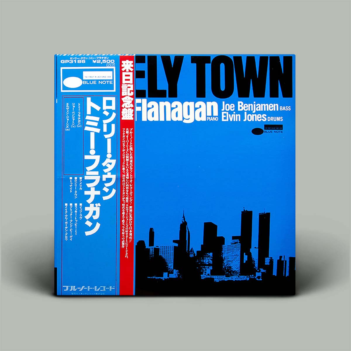 Album cover for 'Fly Town' by Blue Note with city skyline silhouette