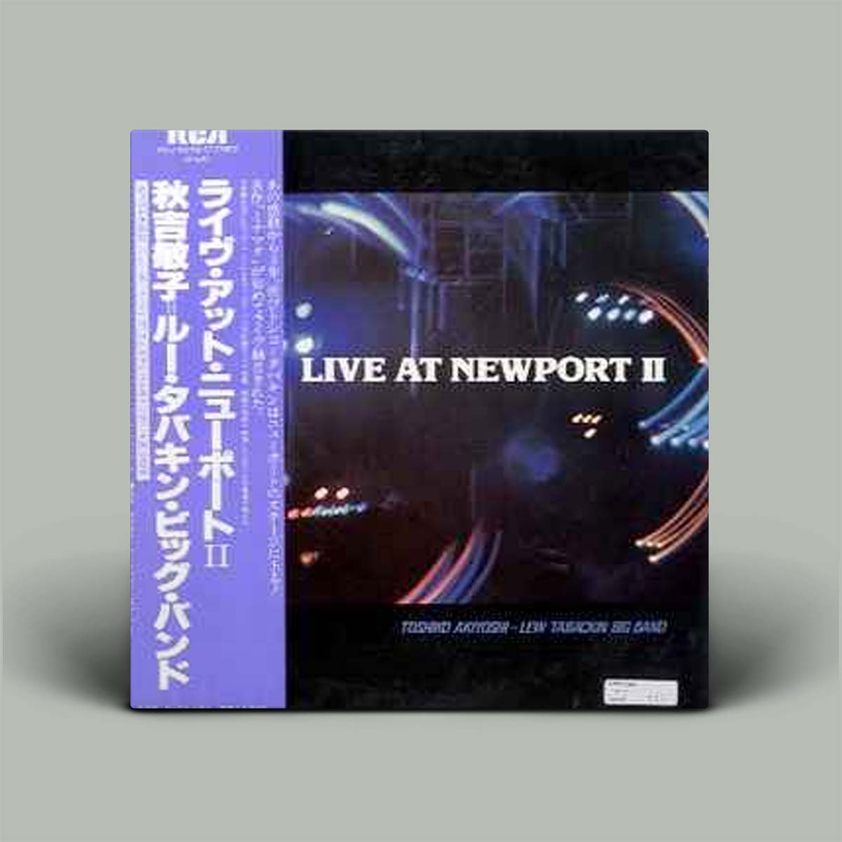 Vinyl record cover for 'Live at Newport II' with Japanese text on a gray background