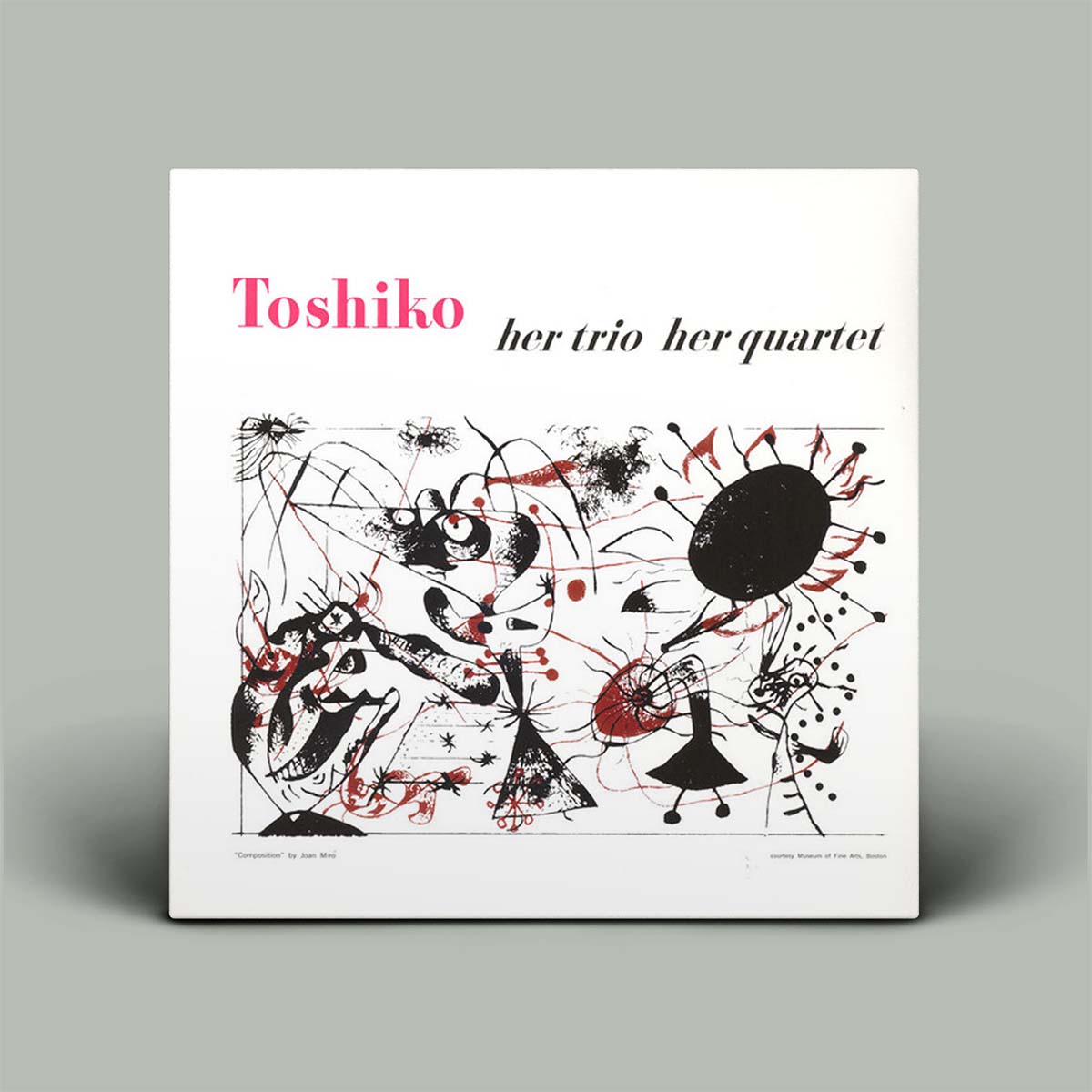 Album cover for 'Toshiko: Her Trio, Her Quartet' with abstract design and text on a gray background