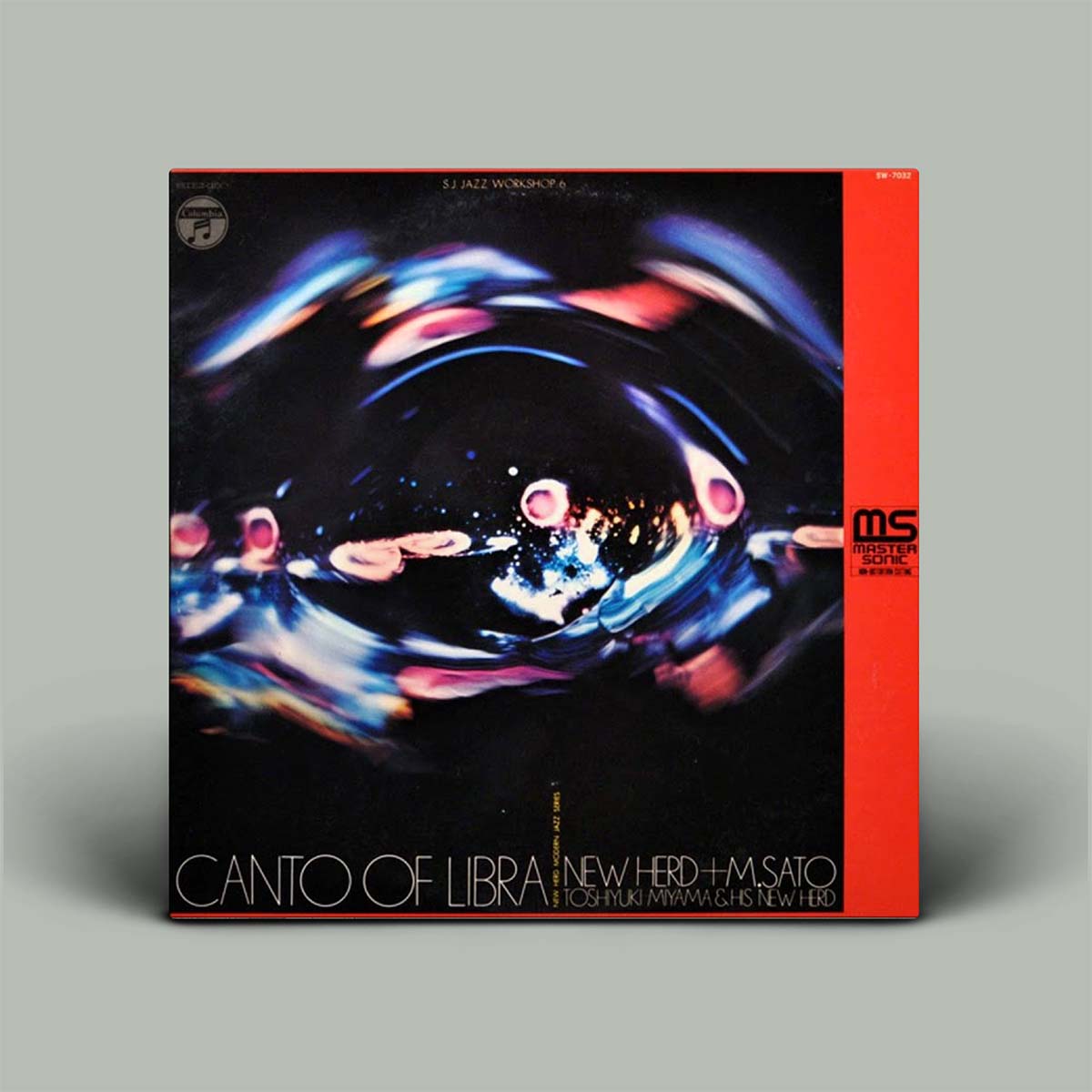 Vinyl record cover with abstract design and text on a gray background