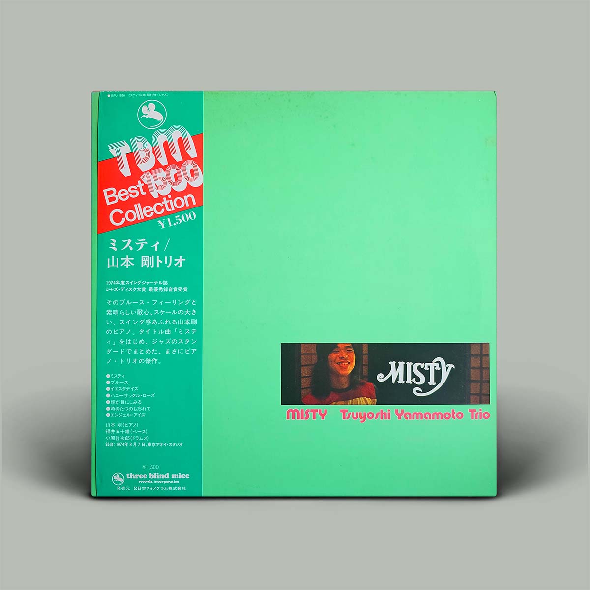 A vinyl record sleeve for the Tsuyoshi Yamamoto Trio's 'Misty' from the TBM Best 100 Collection, featuring a mint green cover with a teal band on the left and a small portrait of the artist.