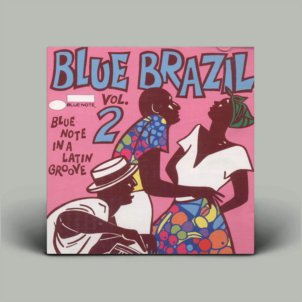 Vinyl record cover titled 'Blue Brazil Vol. 2' with artistic depiction of people on a pink background.