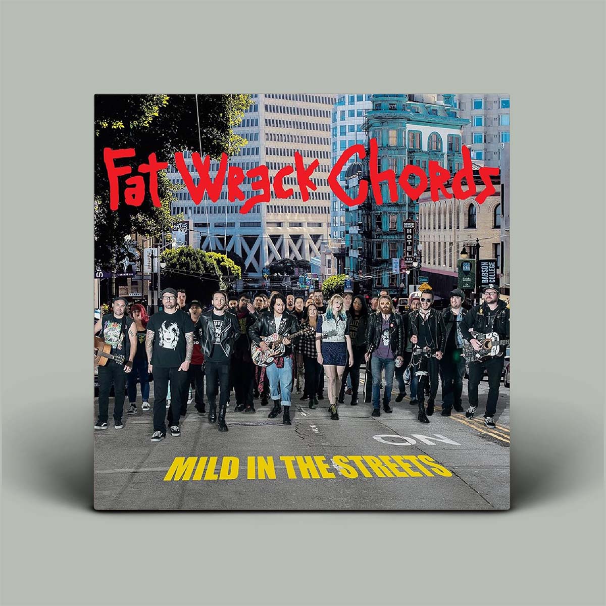 Album cover for 'Mild in the Streets' by Fat Wreck Chords with a group of people on a city street.