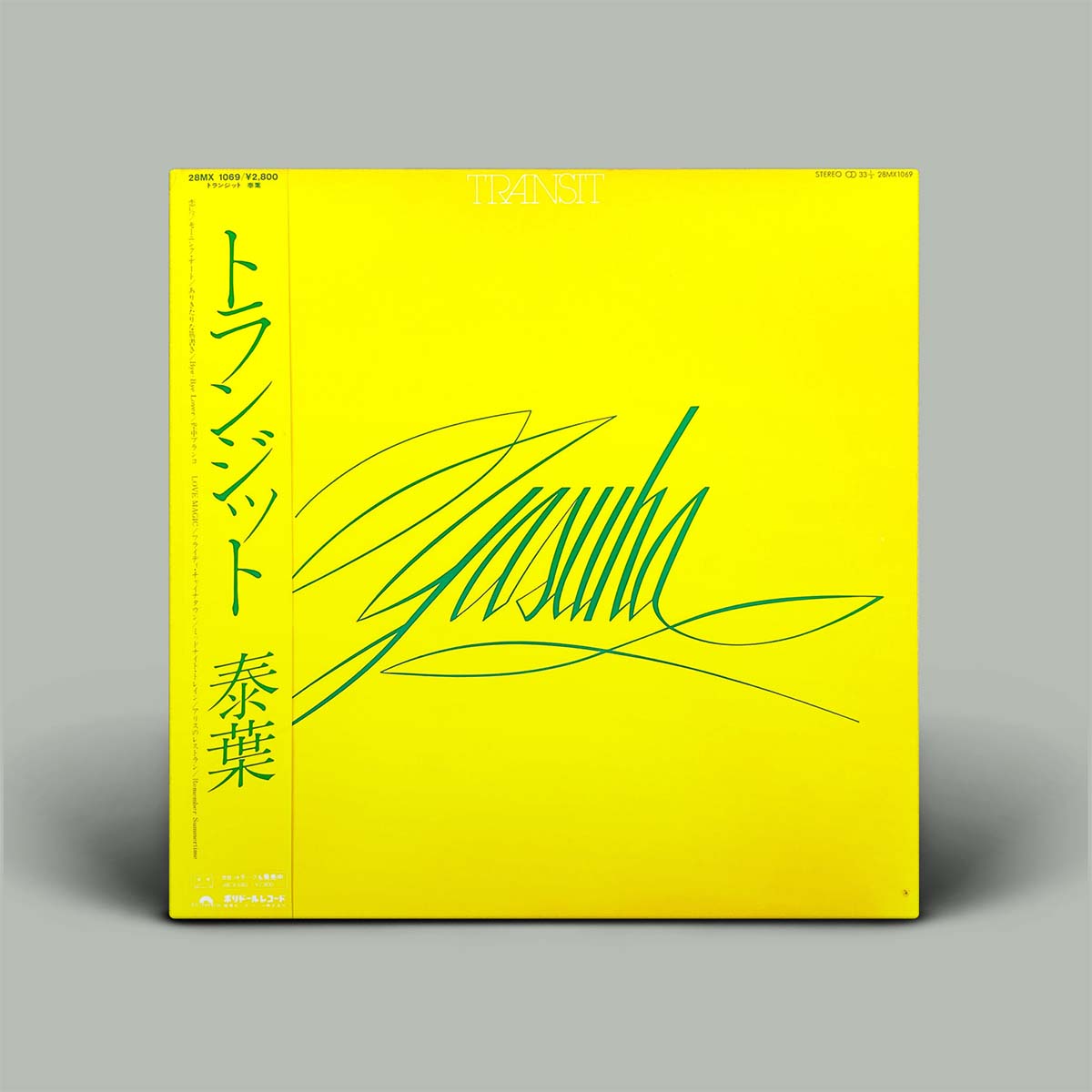 Yellow album cover with green text and abstract design on a gray background